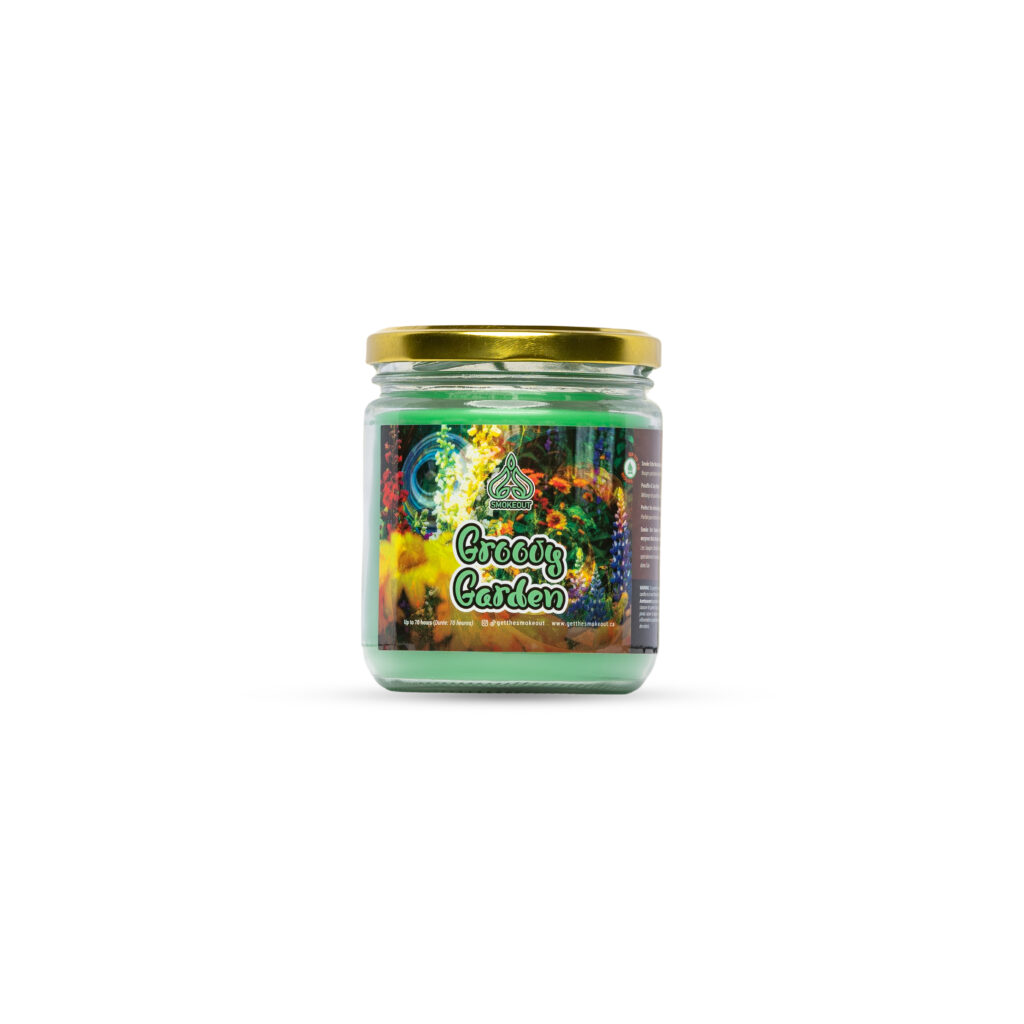 Smoke Out Candles Groovy Garden 13 oz candle in a glass jar with a gold lid